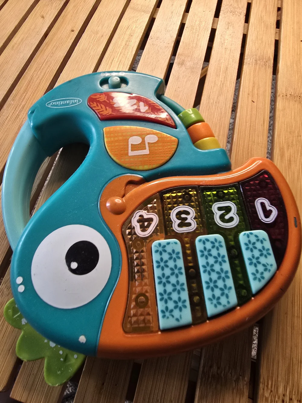 Fisher-Price Teal and Orange Musical Fish Piano